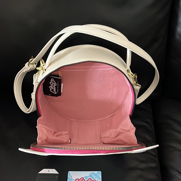 Kirby bag that color changes in the sun. Shoulder bag and backpack. - Picture 2 of 4